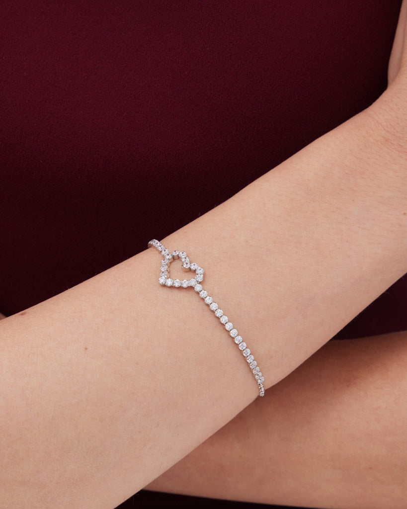 Pulsera Muá corazón con cristales riviere blanco en plata baño rodio