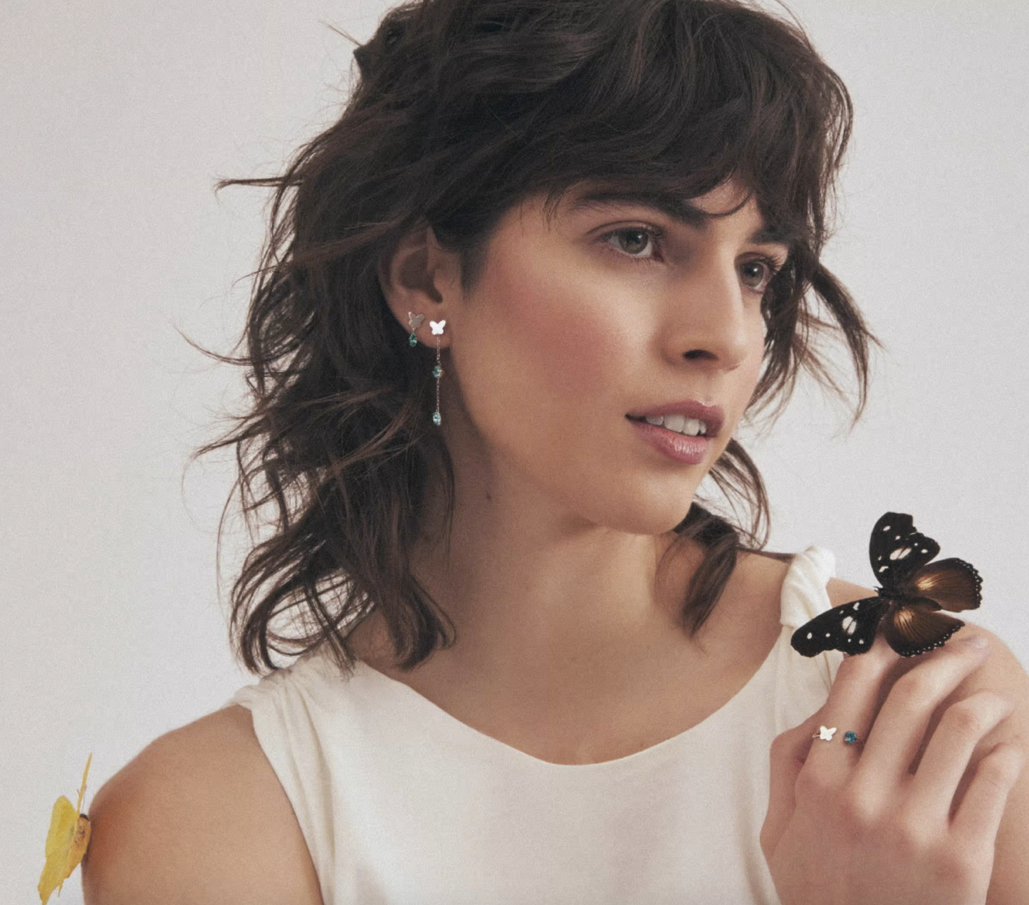 Par de Aros cadena mariposa aquamarine de Cynthia Linet de plata