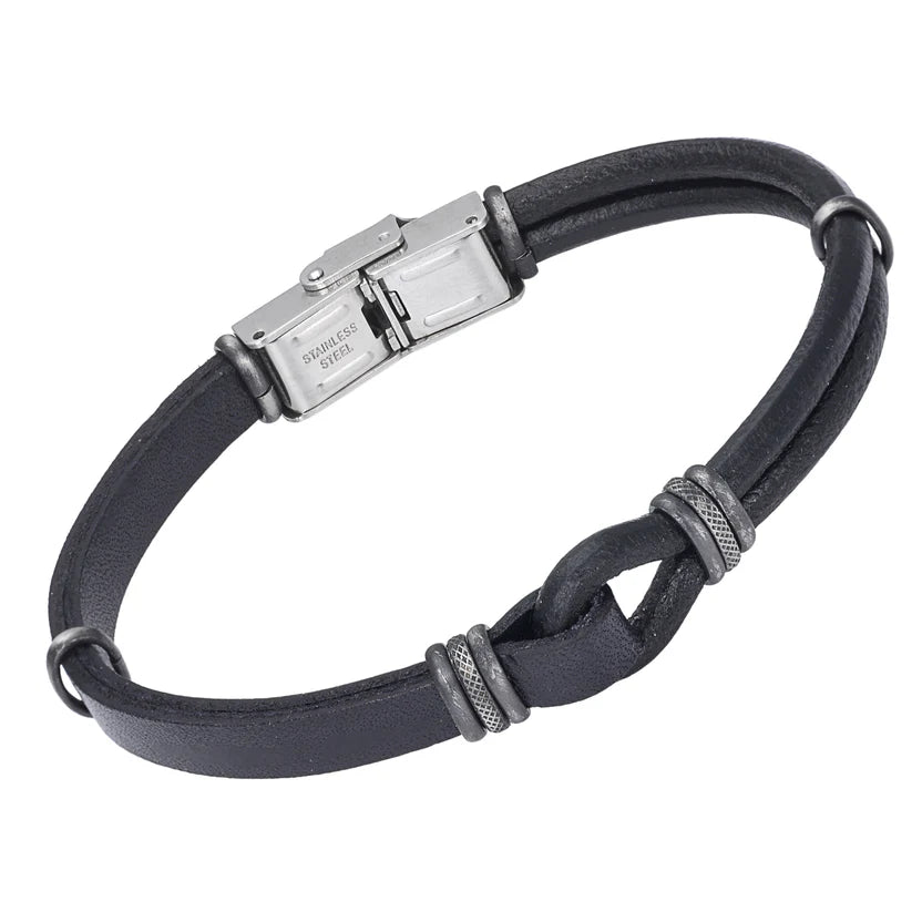 Pulsera de acero con correas negras de cuero negro y estilo vintage.